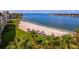 Beautiful waterfront condo featuring a private beach with tiki huts and stunning views at 6081 Bahia Del Mar Cir # 452, St Petersburg, FL 33715