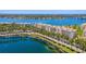 Exterior of the complex features a manicured lawn lined with palm trees and views of the bay at 6081 Bahia Del Mar Cir # 452, St Petersburg, FL 33715