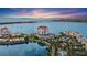 Stunning aerial view of Bahia Point condos on Siesta Key, Florida, with waterfront views and a picturesque sunset at 6287 Bahia Del Mar Cir # 404, St Petersburg, FL 33715