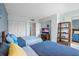 Bedroom featuring two beds, a closet, a TV, and decor at 6287 Bahia Del Mar Cir # 404, St Petersburg, FL 33715