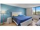 A charming bedroom features bright walls, tile floors, and a nice view at 6287 Bahia Del Mar Cir # 404, St Petersburg, FL 33715