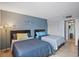 Bright bedroom with two beds, white closet doors, and an ensuite bathroom at 6287 Bahia Del Mar Cir # 404, St Petersburg, FL 33715