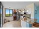 Bright kitchen features stainless steel appliances, granite countertops, and tile flooring at 6287 Bahia Del Mar Cir # 404, St Petersburg, FL 33715
