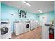 Community laundry room with multiple washers and dryers at 6287 Bahia Del Mar Cir # 404, St Petersburg, FL 33715