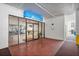 Bahia IV condo entrance featuring tiled floors, glass doors and windows, and access to the parking garage at 6287 Bahia Del Mar Cir # 404, St Petersburg, FL 33715