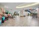 Open lobby with comfortable seating, tile floors, and staircase at 6287 Bahia Del Mar Cir # 404, St Petersburg, FL 33715