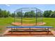 Well maintained baseball field includes a batting cage and shaded bench seating at 7132 Colony Pointe Dr, Riverview, FL 33578