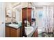 Split view of the bathroom with vanity and shower/tub combination at 7132 Colony Pointe Dr, Riverview, FL 33578