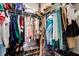 Organized walk-in closet provides ample storage space for clothes and accessories at 7132 Colony Pointe Dr, Riverview, FL 33578