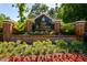 Lake St. Charles entrance sign, beautifully landscaped with colorful flowers and plants at 7132 Colony Pointe Dr, Riverview, FL 33578