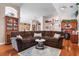 Spacious living room featuring a large sectional sofa and decorative accents at 7132 Colony Pointe Dr, Riverview, FL 33578