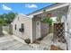 View of exterior with covered patio area featuring metal decorative security at 921 W Coral St, Tampa, FL 33602