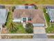 Beautiful home with manicured lawn and landscaping at 9253 Water Hazard Dr, Hudson, FL 34667