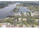 Scenic aerial shot featuring a waterfront community, intercoastal waterway, and a lush, green landscape at 9914 Alavista Dr, Gibsonton, FL 33534