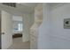 Neat, organized walk-in closet providing ample storage, leading into the bedroom at 9914 Alavista Dr, Gibsonton, FL 33534