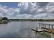 Lake view with houses, docks, and lots of vegetation at 9914 Alavista Dr, Gibsonton, FL 33534