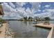 Lake view with houses, docks, and lots of vegetation at 9914 Alavista Dr, Gibsonton, FL 33534