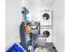 Utility room features stacked washer and dryer at 10243 114Th Ter, Largo, FL 33773