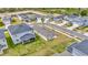 Quiet suburban community with single-Gathering homes, serene pond, and lush greenery creating a peaceful and inviting atmosphere at 10360 Honeysuckle Vine Cir, Riverview, FL 33578