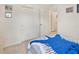 Bright bedroom features closet, neutral paint and bedspread at 10360 Honeysuckle Vine Cir, Riverview, FL 33578