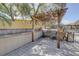 Outdoor grill area with stainless steel grills, counter space, and a pergola for shade, perfect for outdoor cooking at 10509 Waterview Ct, Tampa, FL 33615