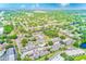 Aerial view of townhome community close to the water, and many options for entertainment and travel at 1137 King Arthur Ct # 501, Dunedin, FL 34698