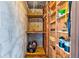 Efficient storage space featuring built-in shelving for organization and maximizing storage potential at 1137 King Arthur Ct # 501, Dunedin, FL 34698