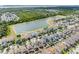 A Primary-planned community surrounds a large lake with meticulously kept homes at 12028 Citrus Leaf Dr, Gibsonton, FL 33534