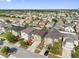 A high-angle aerial view of a vibrant residential community with well-maintained lawns at 12028 Citrus Leaf Dr, Gibsonton, FL 33534
