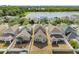 Backyards featuring lush landscaping and well-manicured lawns near the lake offer peaceful outdoor spaces at 12028 Citrus Leaf Dr, Gibsonton, FL 33534