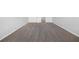 Neutral bedroom with carpeting and walls freshly painted in light gray at 12028 Citrus Leaf Dr, Gibsonton, FL 33534