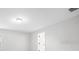 Neutral bedroom with carpeting and walls freshly painted in light gray at 12028 Citrus Leaf Dr, Gibsonton, FL 33534