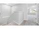Neutral bedroom with carpeting and walls freshly painted in light gray at 12028 Citrus Leaf Dr, Gibsonton, FL 33534