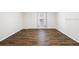 Bright living room featuring hardwood floors and a window with natural light at 12028 Citrus Leaf Dr, Gibsonton, FL 33534