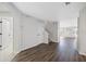 Spacious living room with new hardwood floors, neutral walls, and plenty of natural light at 12028 Citrus Leaf Dr, Gibsonton, FL 33534