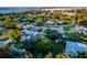 Aerial view of neighborhood, showcasing lush landscaping and waterfront location at 1211 64Th Nw St, Bradenton, FL 34209