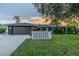 Charming single-story home with a well-manicured lawn and a two-car garage in a quiet neighborhood at 1211 64Th Nw St, Bradenton, FL 34209