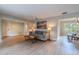 An open-concept living space with modern wood floors, comfortable seating, and ample room for entertaining at 1211 64Th Nw St, Bradenton, FL 34209