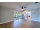 Open living space with sliding doors that offers access and view to the patio at 1211 64Th Nw St, Bradenton, FL 34209