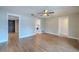 Open Living Room with laundry area view, leading to front entry door at 1211 64Th Nw St, Bradenton, FL 34209