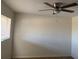 Bright bedroom featuring a ceiling fan and a window with blinds at 1257 Drew St # 15, Clearwater, FL 33755