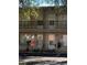 Exterior of the multi-Gathering building with a tow away zone sign and black metal railings at 1257 Drew St # 15, Clearwater, FL 33755