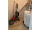 Storage space with cleaning supplies and a water heater at 1257 Drew St # 15, Clearwater, FL 33755