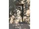 Exterior view of a storage room door in a shadowed hallway at 1257 Drew St # 15, Clearwater, FL 33755