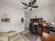 Versatile home office with comfortable seating, perfect for focused work and relaxation at 12669 Eastpointe Dr, Dade City, FL 33525