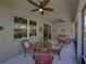 The spacious screened patio includes multiple seating areas, perfect for entertaining and enjoying outdoor living at 12669 Eastpointe Dr, Dade City, FL 33525