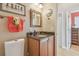 Bathroom vanity with granite countertops and stylish fixtures at 1326 Apollo Beach S Blvd, Apollo Beach, FL 33572