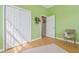 Bedroom featuring hardwood floors, closet and access to additional rooms at 1326 Apollo Beach S Blvd, Apollo Beach, FL 33572