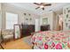 Spacious bedroom with bay windows, wooden floors, and a closet at 1326 Apollo Beach S Blvd, Apollo Beach, FL 33572