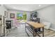 Bright bonus room with light gray walls, butcher block counter and views of the tropical outdoor space at 1326 Apollo Beach S Blvd, Apollo Beach, FL 33572